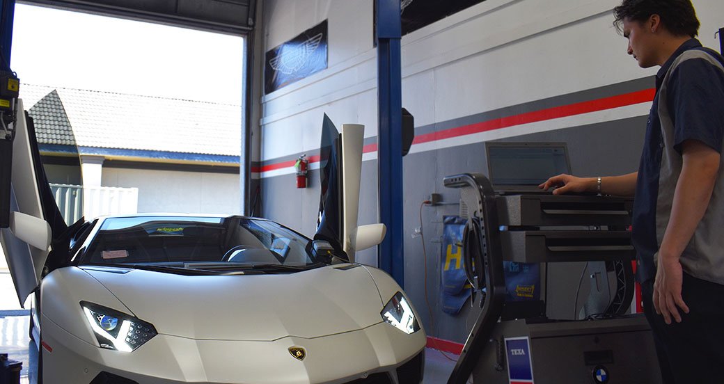 Autowerks European technician diagnosing a Lamborghini